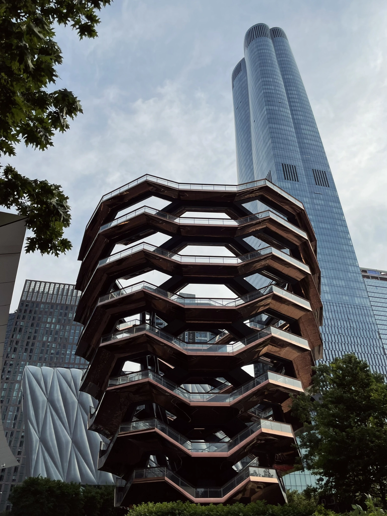 The Vessel at Hudson Yards: steps against the city skyline.